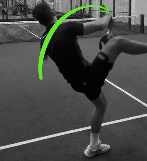 Two padel players at the net during a match